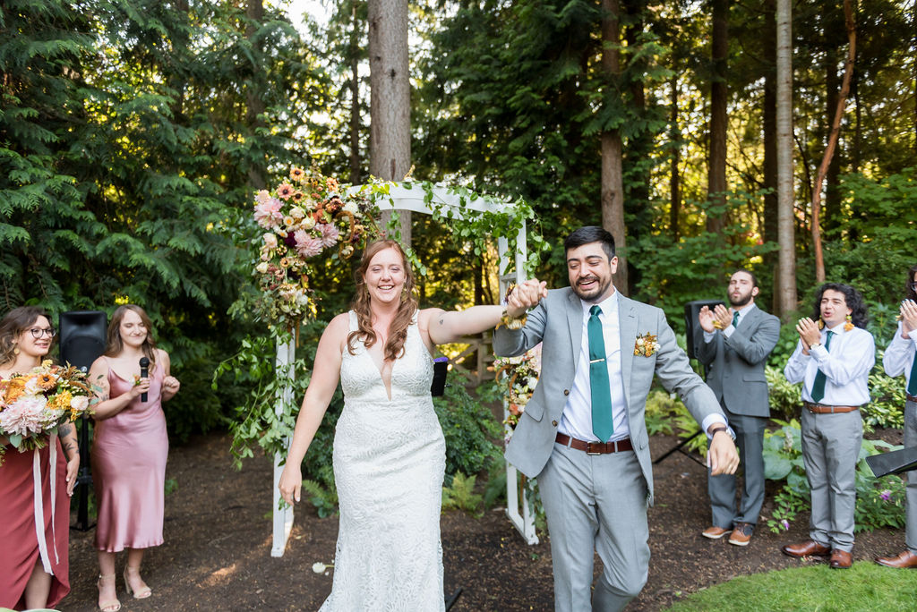 Couple just married walking down aisle