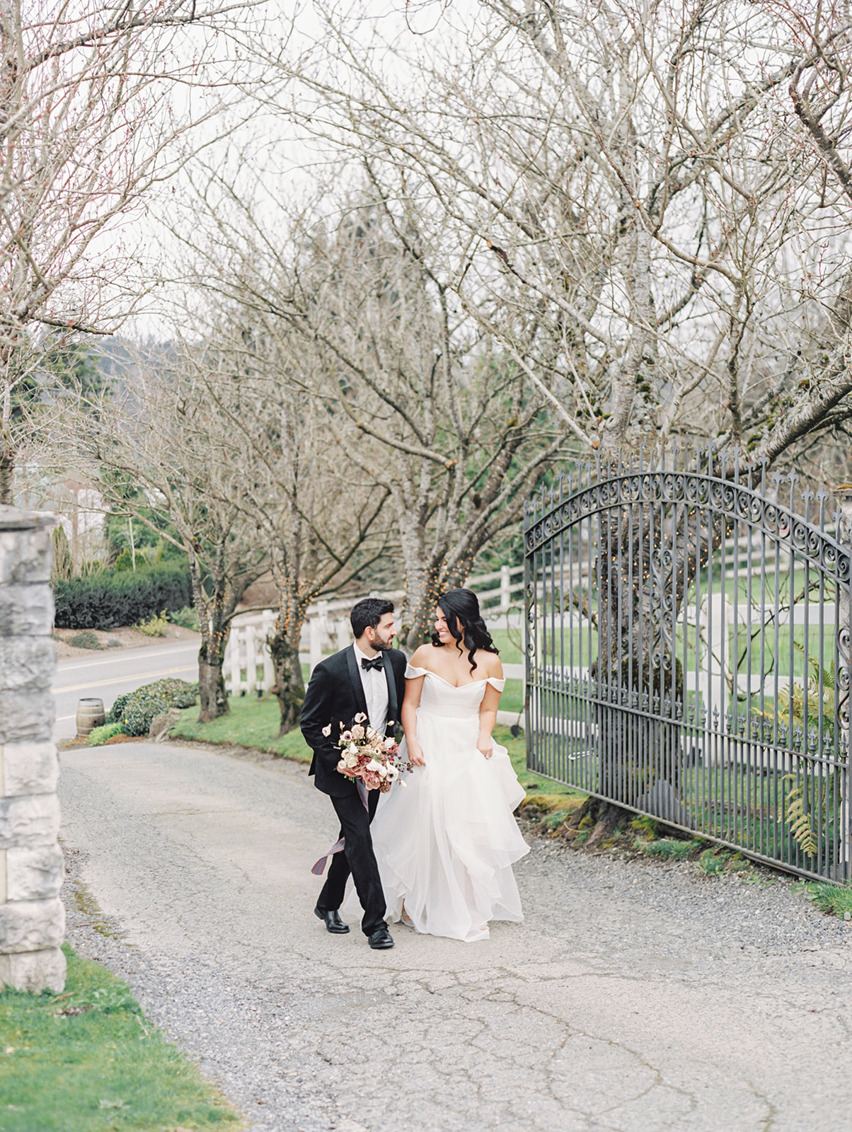 Chateau-Lill-Wedding-Entrance-to-Chateau-Lill.jpg The couple holding hands and walking up the entrance to Chateau Lill