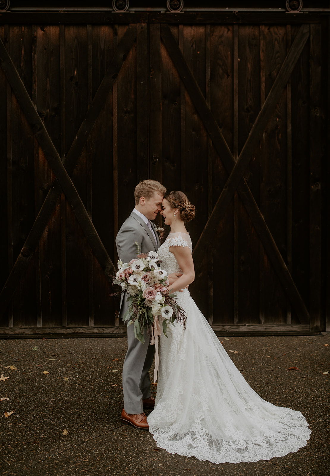 First look couple holding bouquet