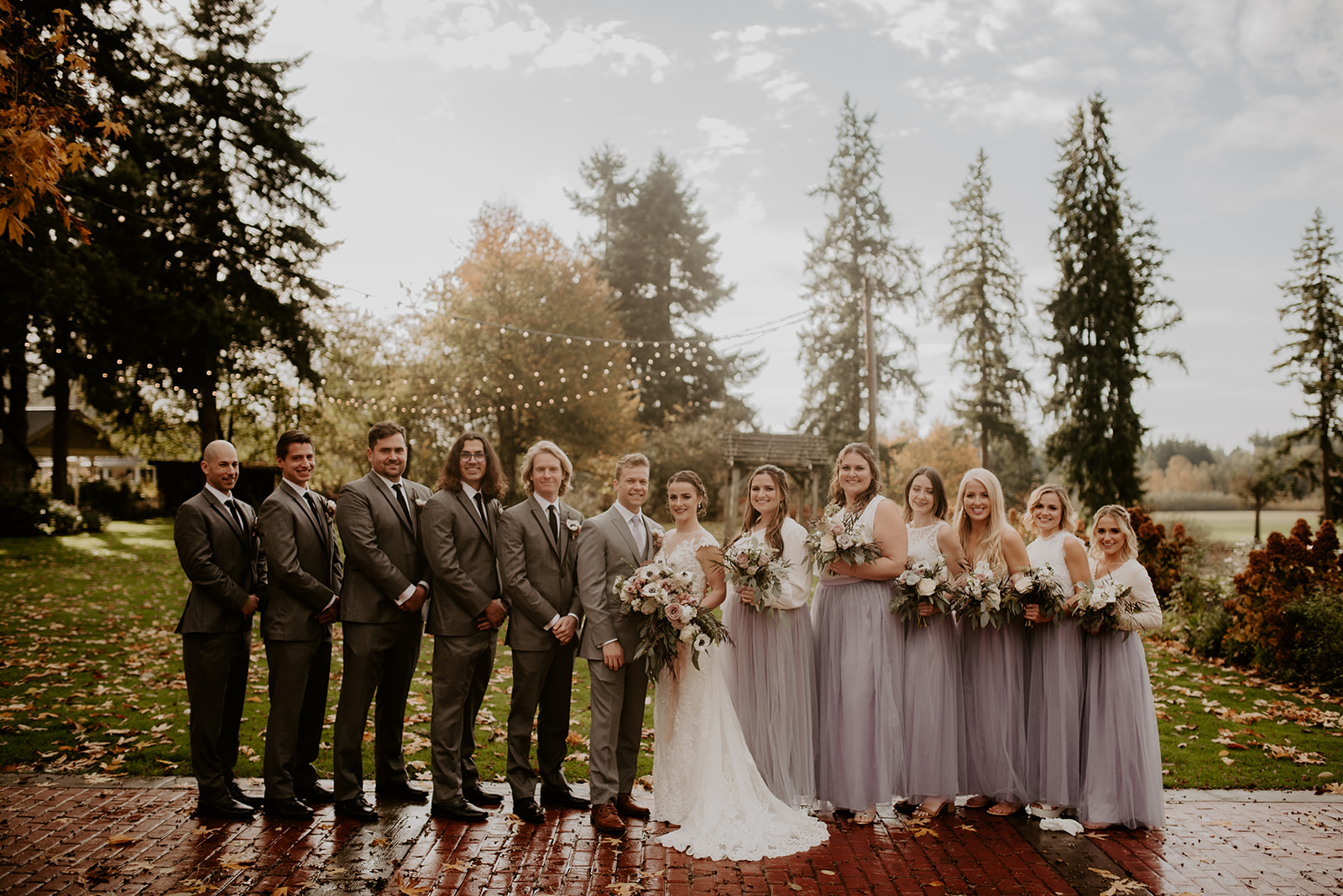 The wedding party poses for pictures at Kelley Farm