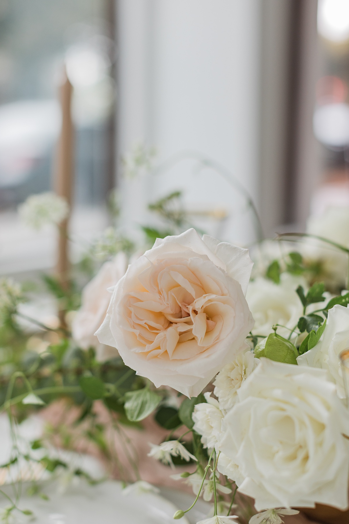 Modern-White-Wedding-Garden-Roses A close up of white and blush garden roses
