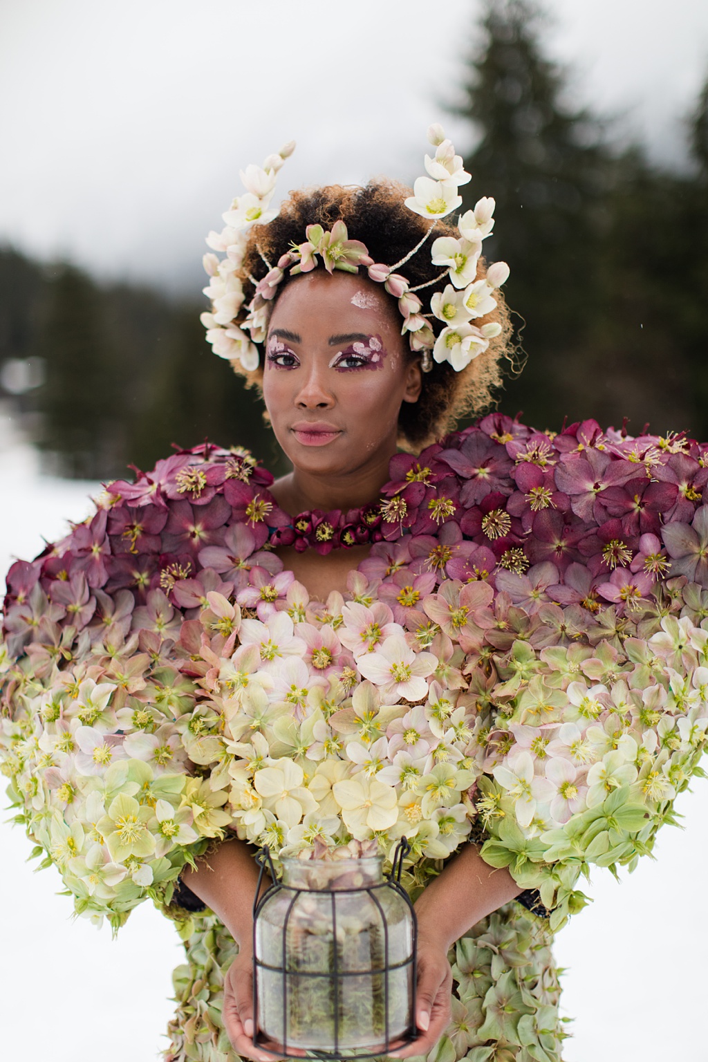 Seattle-Wedding-Florist-Bloom-Poet-Couture-Flower-Dress-American-Flowers-Week-2021-Model-Holding-Lantern A bespoke flower dress made of hellebores, with model holding lantern