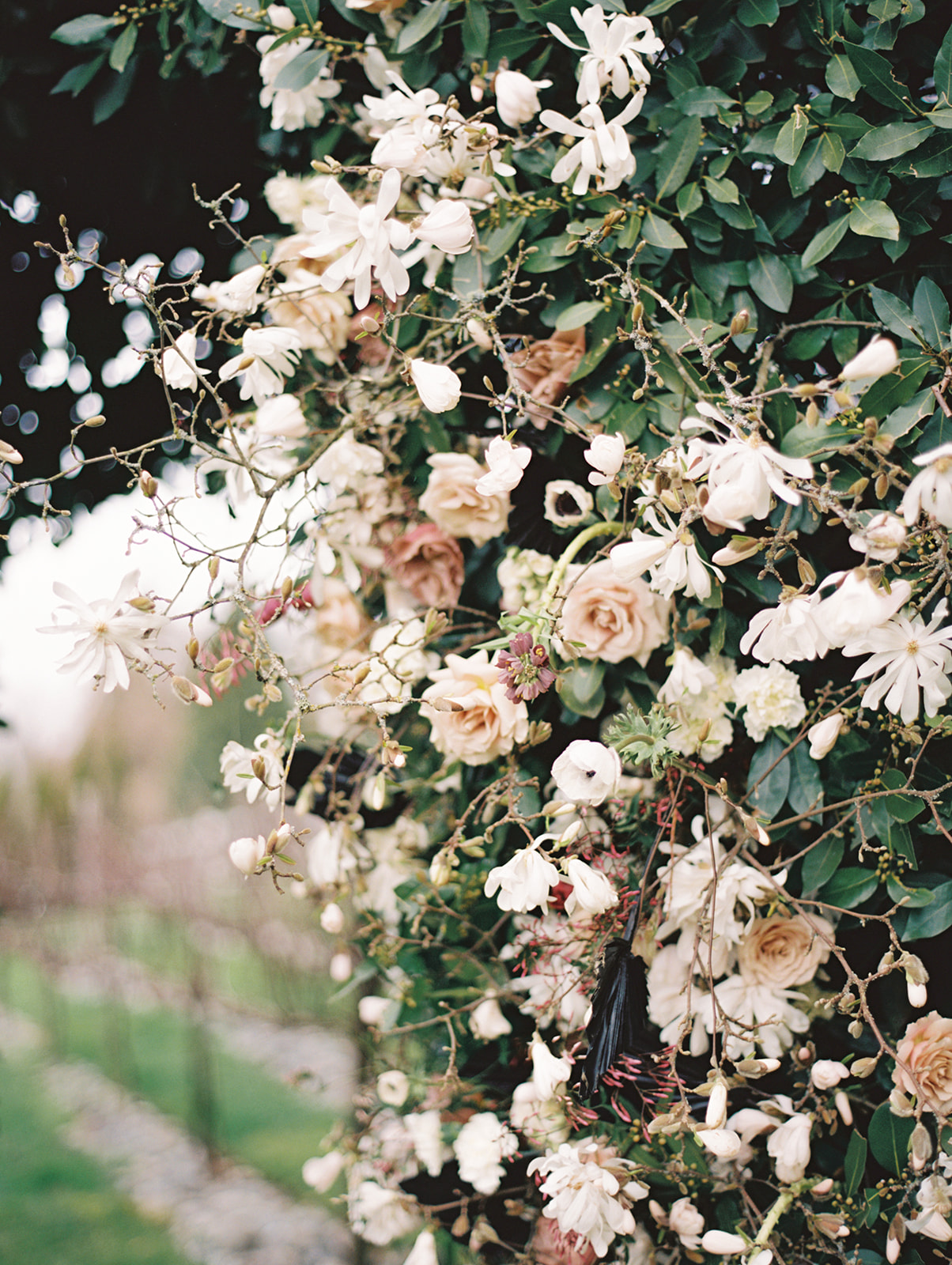 Chateau Lill Spring Editorial | Full Gallery A floral hedge installation at Chateau Lill wedding ceremony outdoors