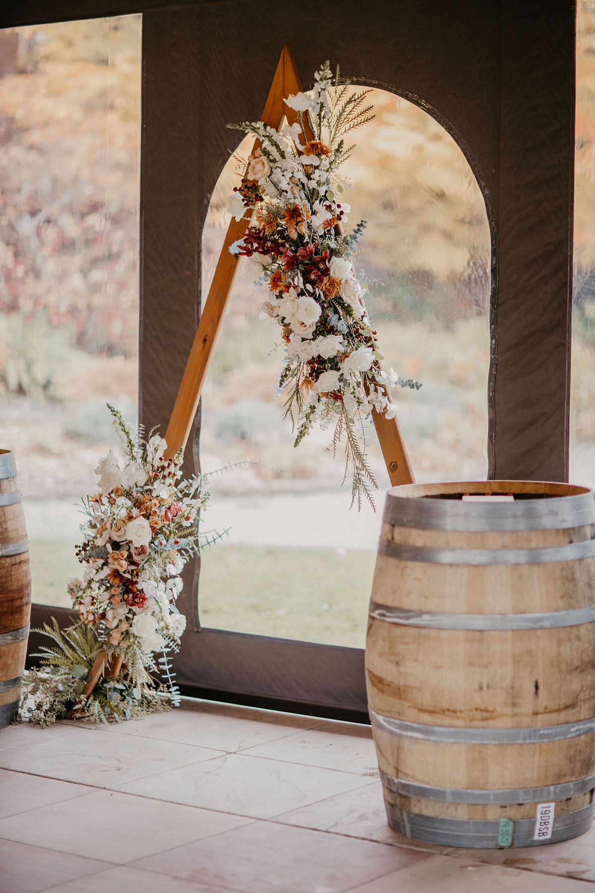 wedding arch flowers at the Willows Lodge in the garden gazebo