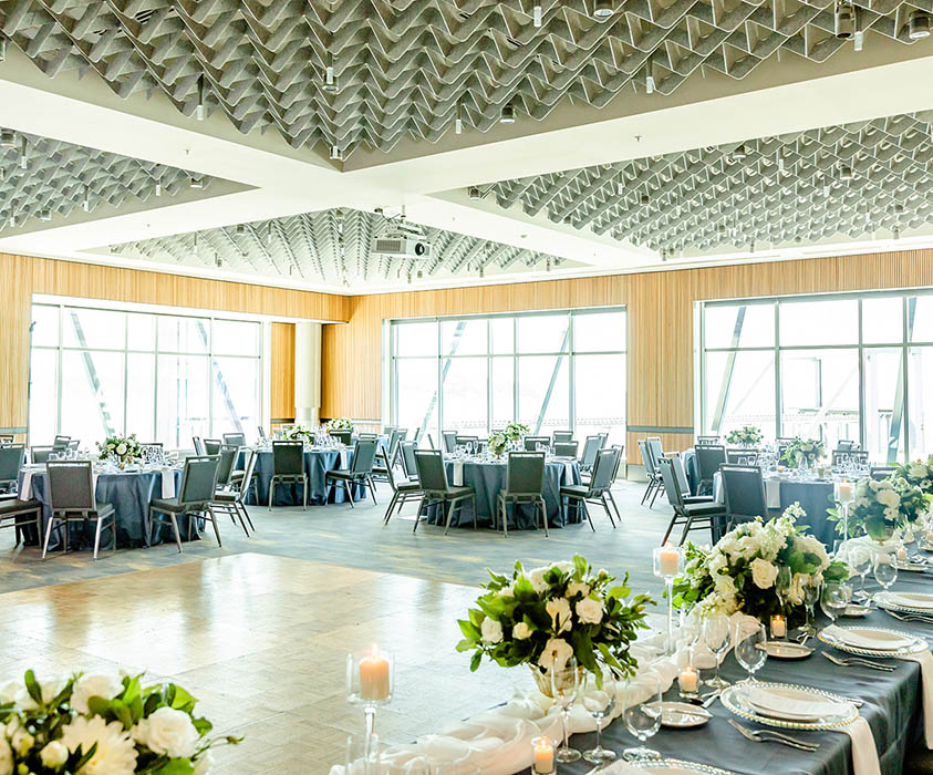 Bell Harbor International Conference Center bell harbor international conference center indoor wedding venue space with tall windows and lots of natural light