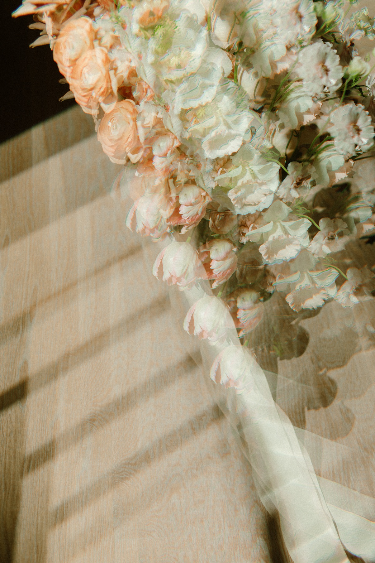 An artistic photograph with repeating images of the block 41 wedding bouquet