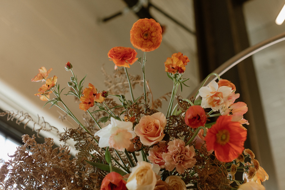 A close up of the Block 41 wedding circle arch florals
