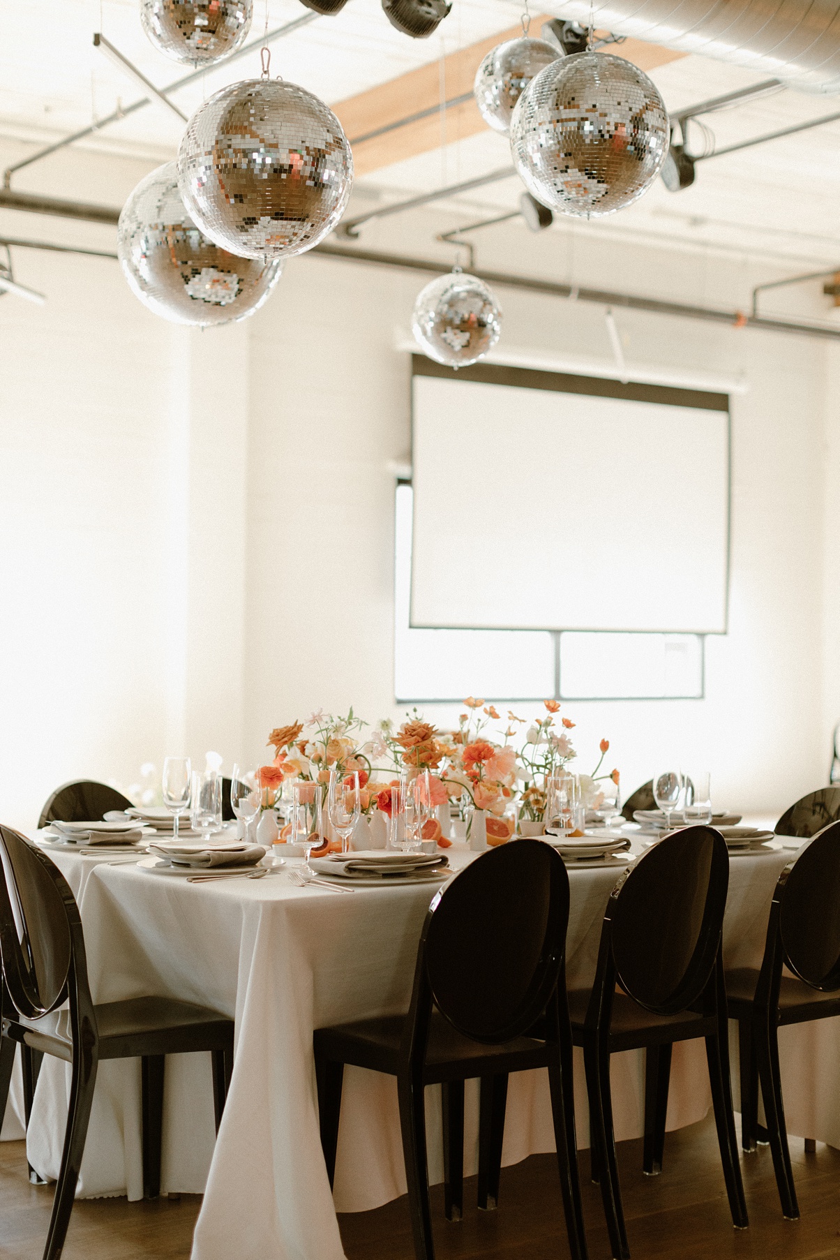 The Block 41 wedding's king's table with disco balls above