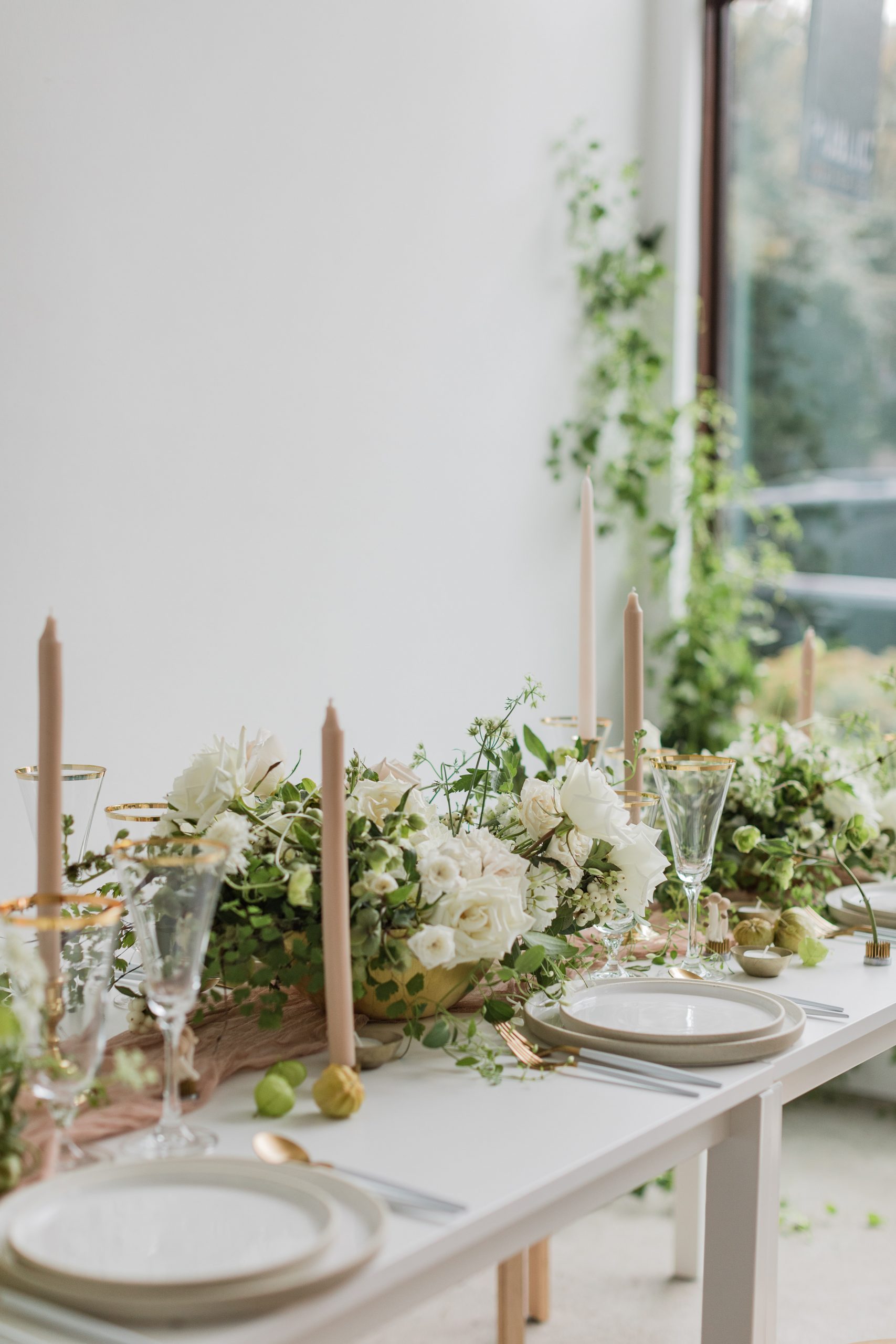 Modern-White-Wedding-Table-With-Window A white wedding table setup with window in the background