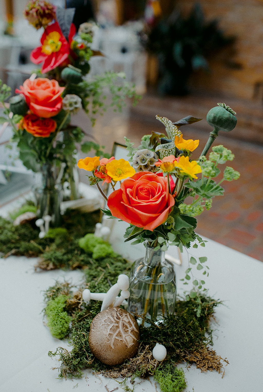 Florals on the bar of the wedding at Kiana Lodge