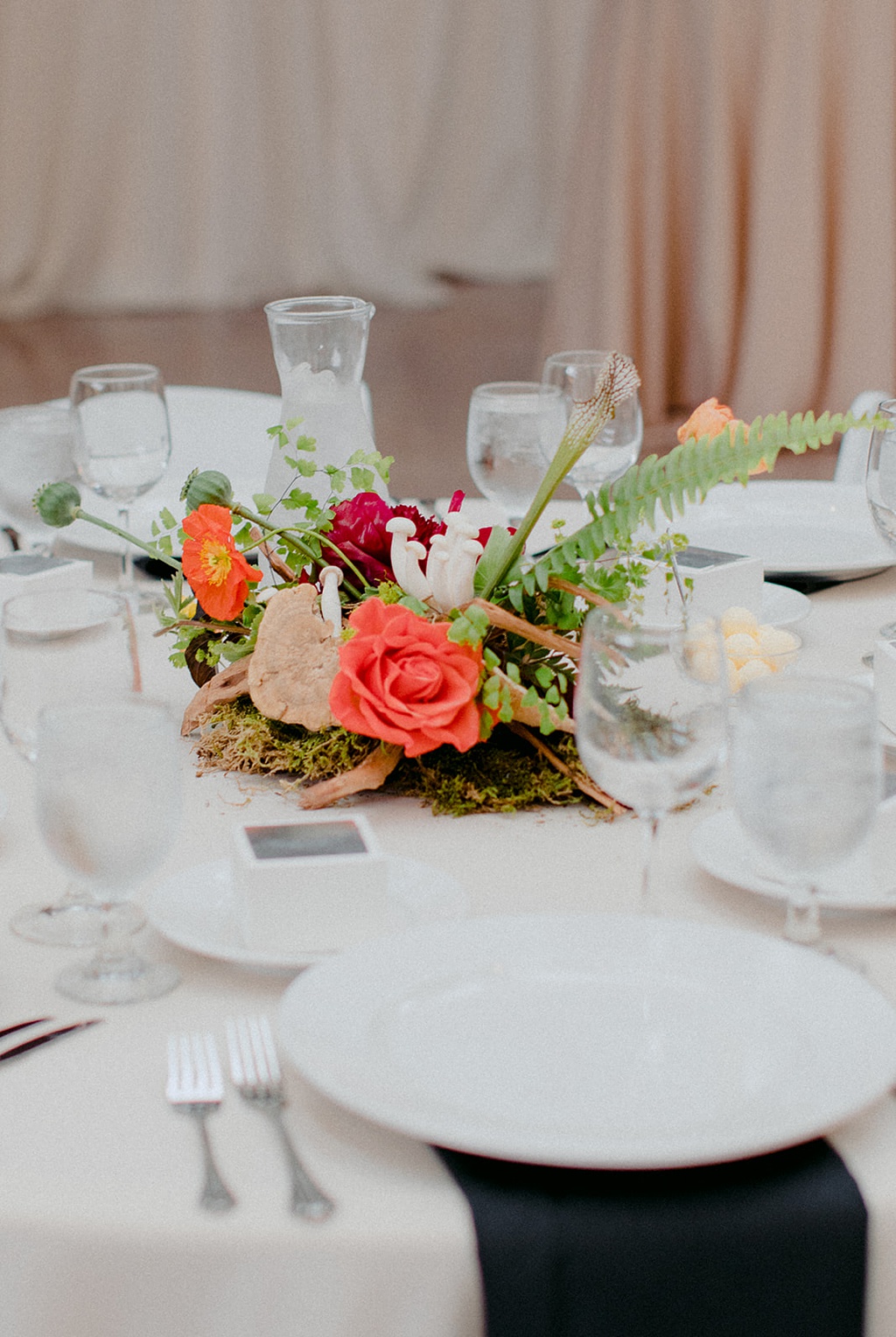 Wedding reception centerpiece at Kiana Lodge
