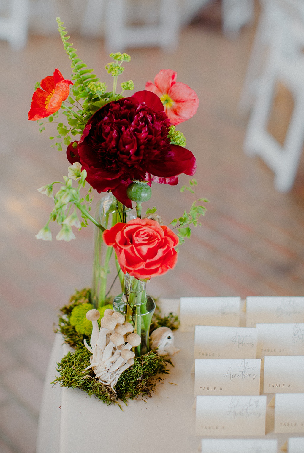 A peony arrangement at the escort card table at Kiana Lodge
