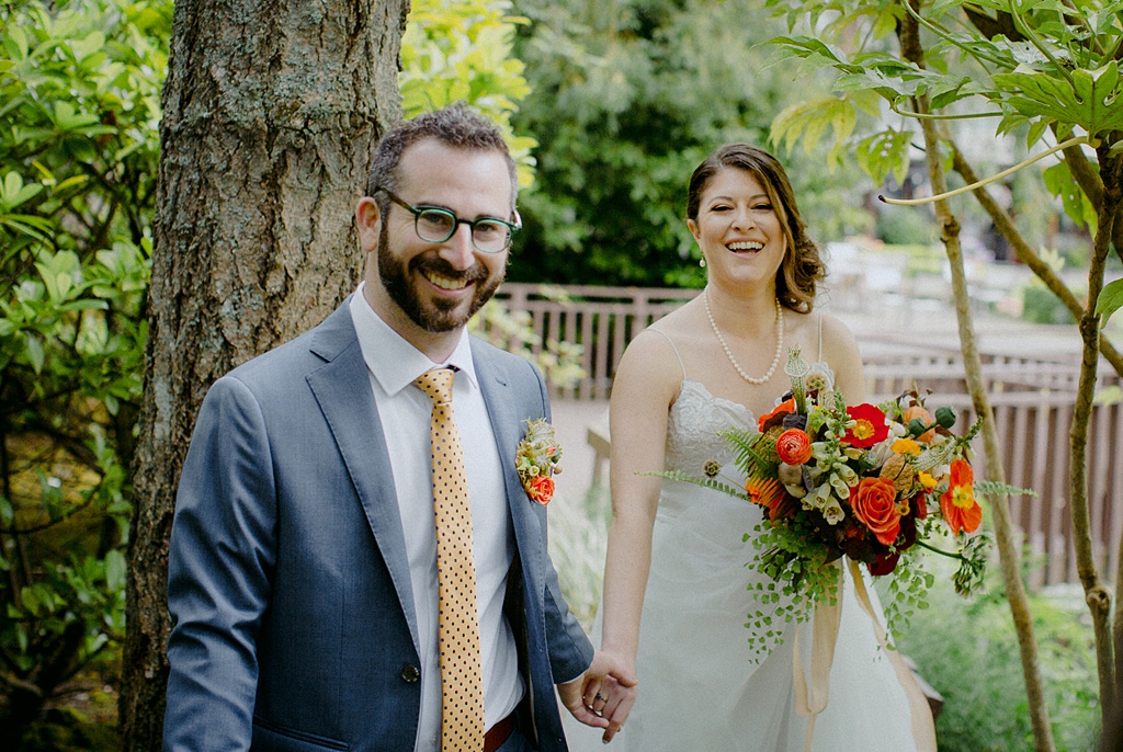 A portrait of a wedding couple in the forest at Kiana Lodge