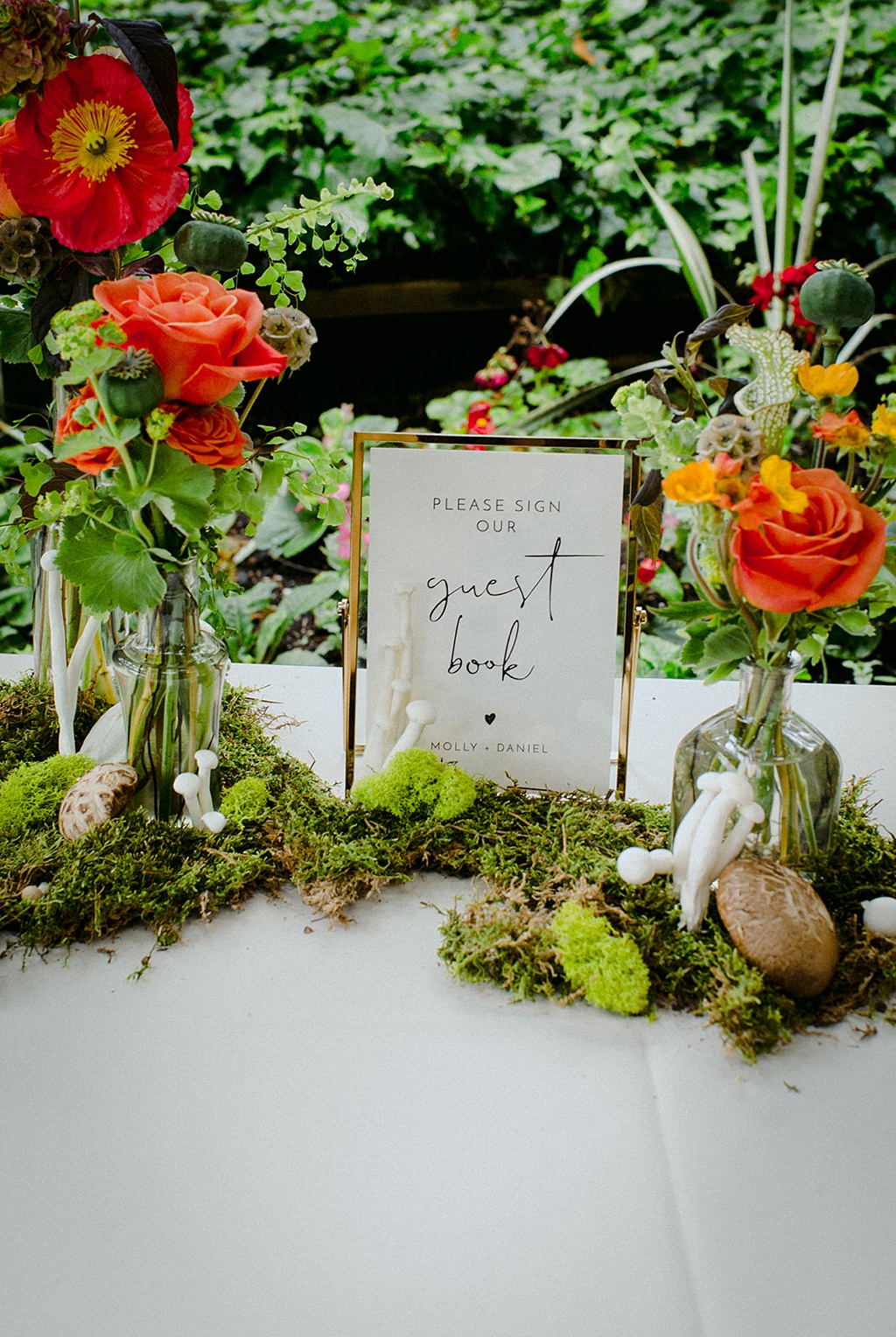 Guest book flowers at the entrance to this Kiana Lodge wedding