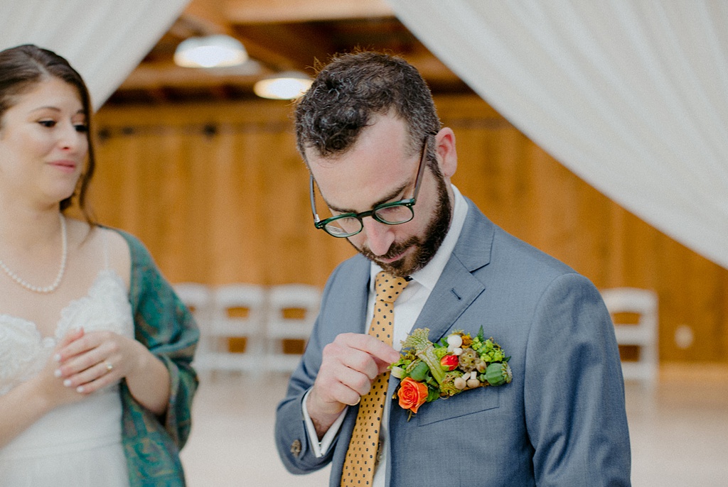 The groom's pocket square made from mushrooms and other botanicals