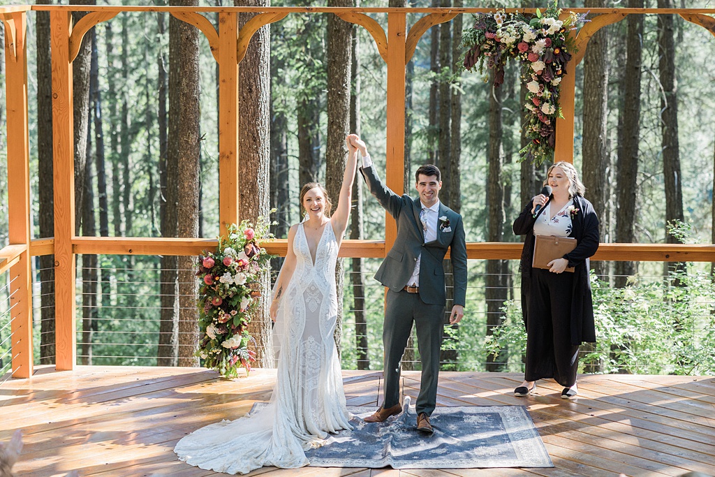Bloom-Poet-Seattle-Wedding-Florist-Tierra-Retreat-Center-Wedding-Just-Married The couple celebrates the end of their wedding ceremony at this Tierra Retreat Center wedding