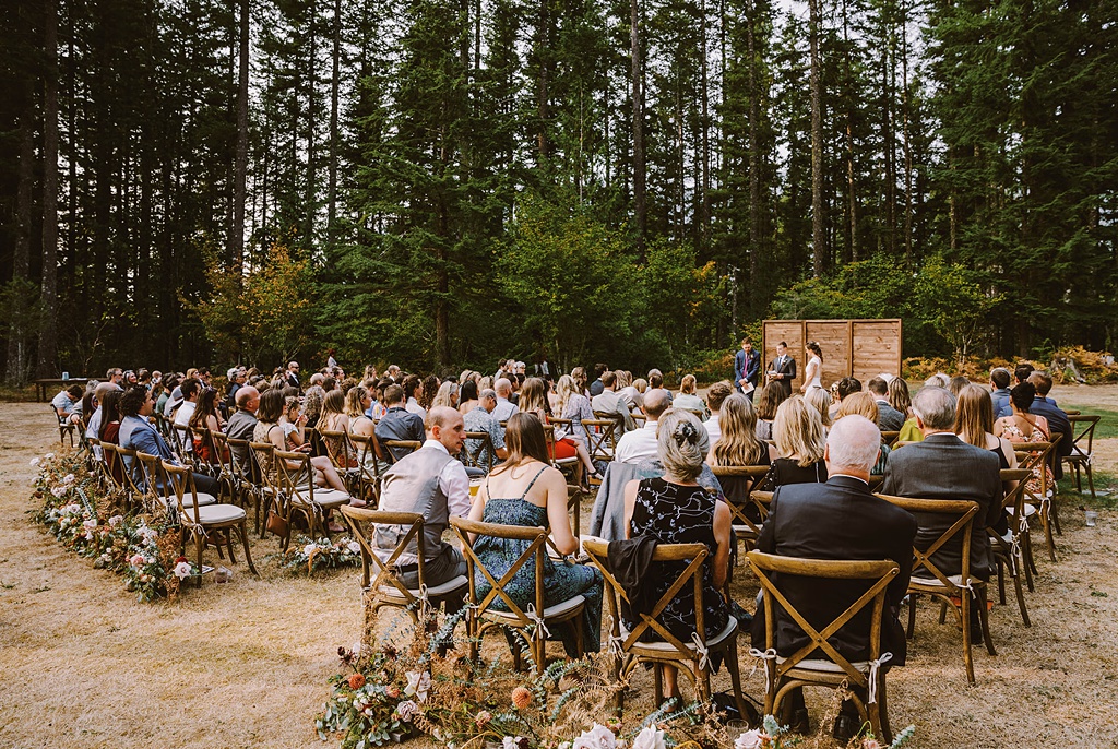 Bloom-Poet-Seattle-Wedding-Florist-Summer-Wedding-Ceremony.jpg The wedding ceremony, including florals at the back of the aisles, at this summer wedding