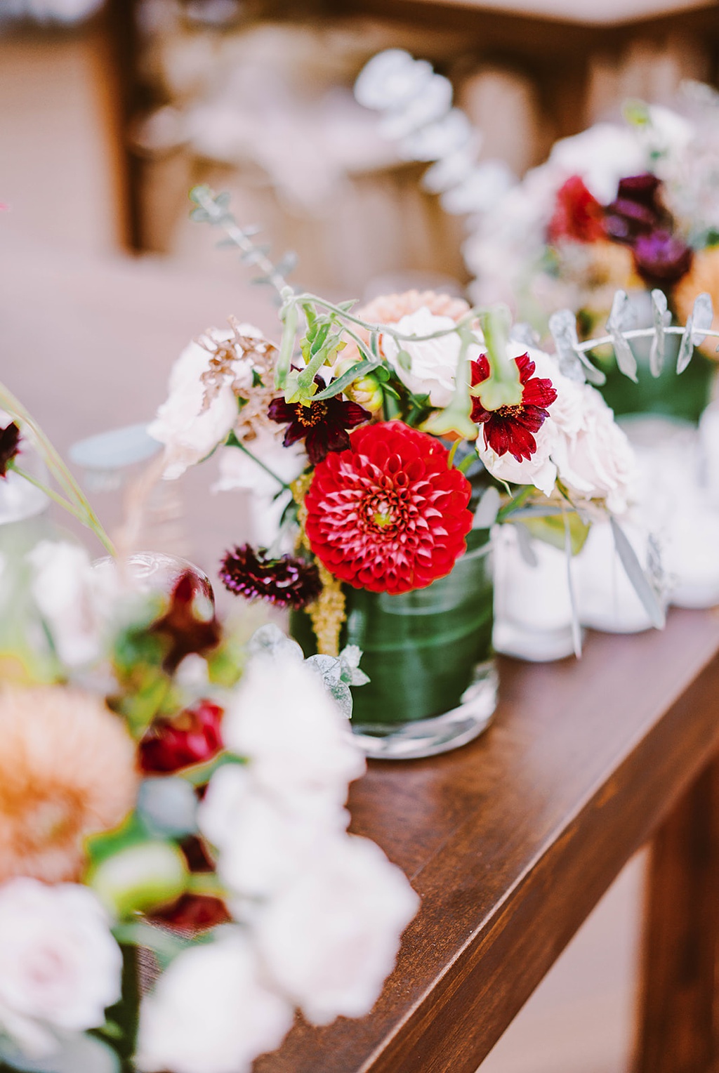 Bloom-Poet-Seattle-Wedding-Florist-Summer-Wedding-Cocktail-Florals.jpg Pops of colorful dahlias for cocktail table flowers at this summer wedding
