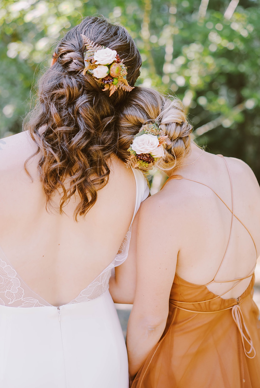 Bloom-Poet-Seattle-Wedding-Florist-Summer-Wedding-Hair-Flowers.jpg The bride and a friend show off their summer wedding hair flowers