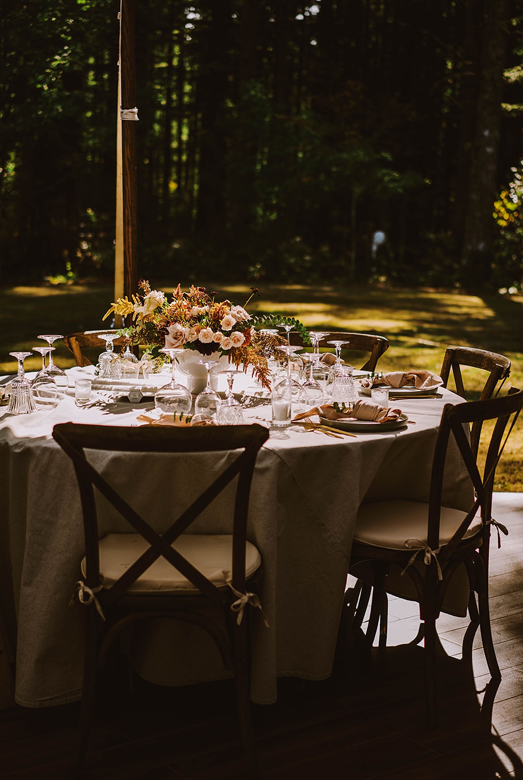 Bloom-Poet-Seattle-Wedding-Florist-Summer-Wedding-Reception-Table.jpg A moody shot of a summer wedding table in the sun and shade