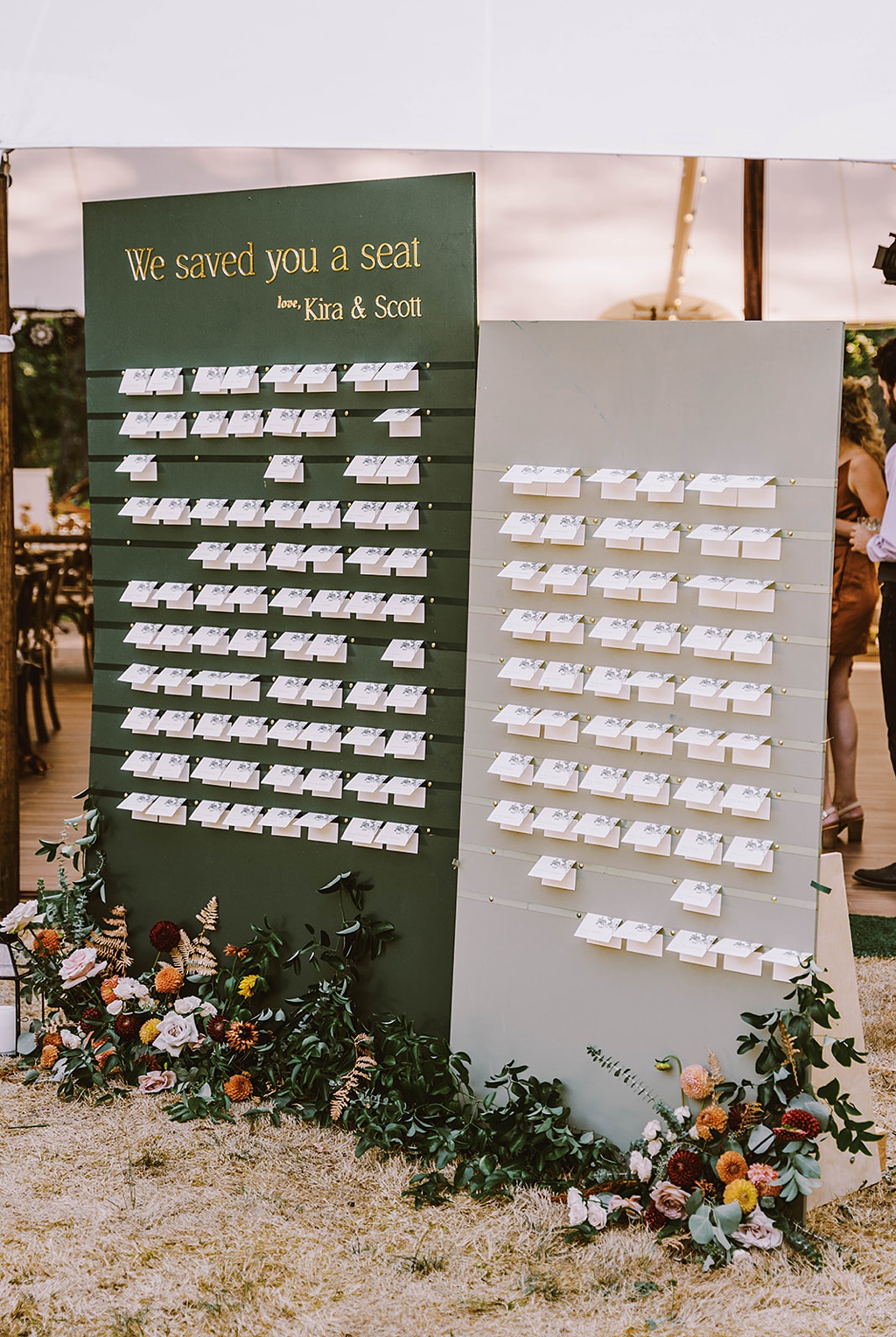Bloom-Poet-Seattle-Wedding-Florist-Summer-Wedding-Seating-Chart.jpg A wedding seating chart with escort cards and a floral installation