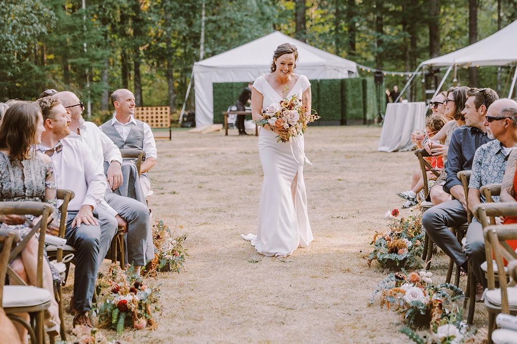 Bloom-Poet-Seattle-Wedding-Florist-Summer-Wedding-Walking-Down-Aisle.jpg The bride walks down her own aisle at this modern summer wedding